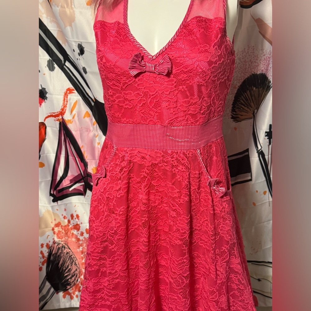 Sourpuss fuchsia lace sleeveless fashion dress with bow detailing with netting